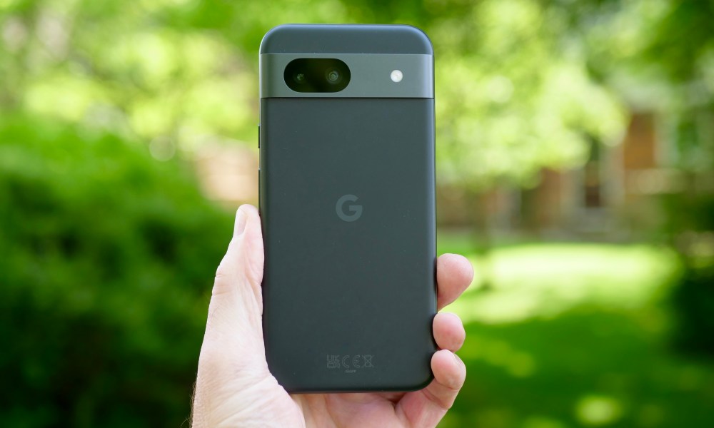 A person holding the Google Pixel 8a.