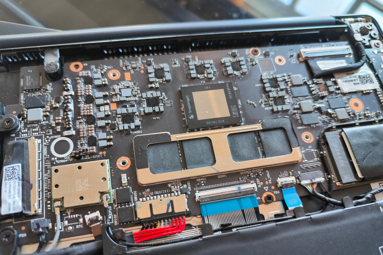 The Snapdragon X Elite chip installed in a laptop.
