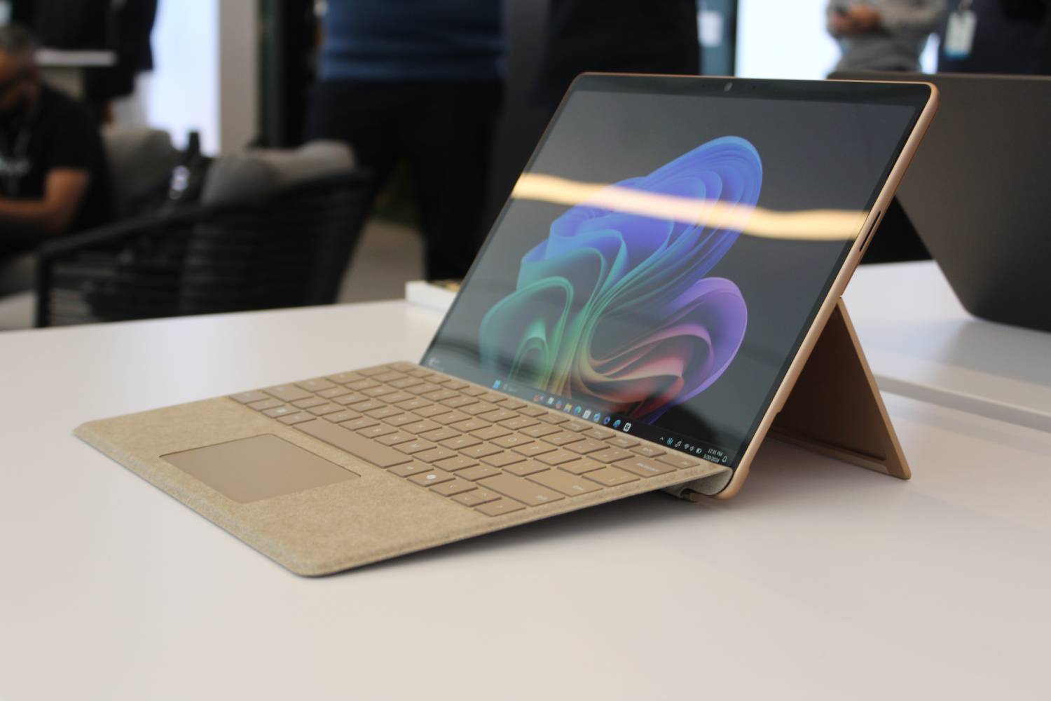 The Surface Pro with the keyboard attached on a table.