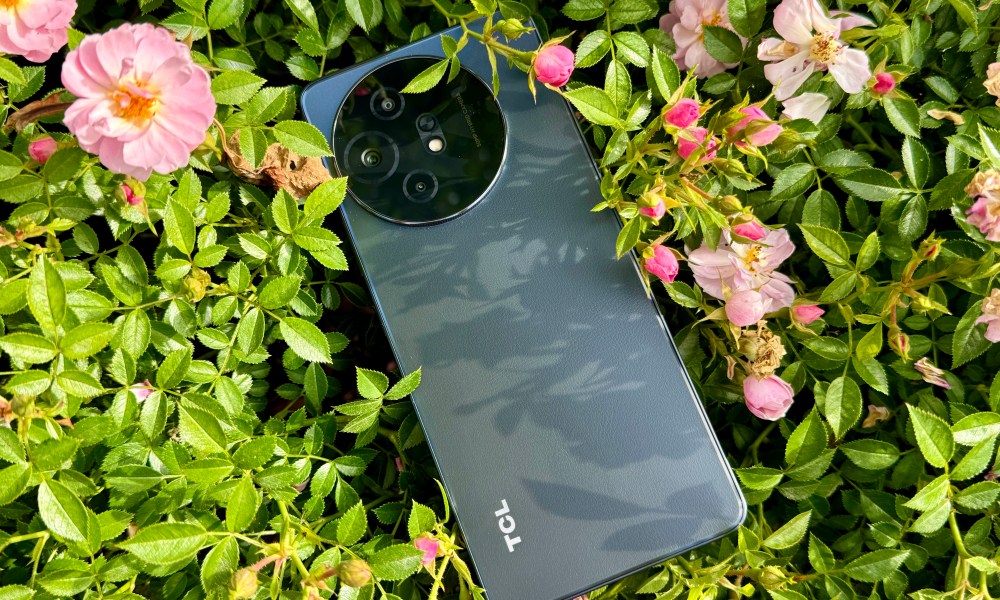 TCL 50 XL 5G in a bush.