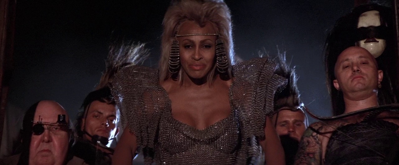 Tina Turner as Aunty Entity flanked by her minions in Mad Max Beyond Thunderdome
