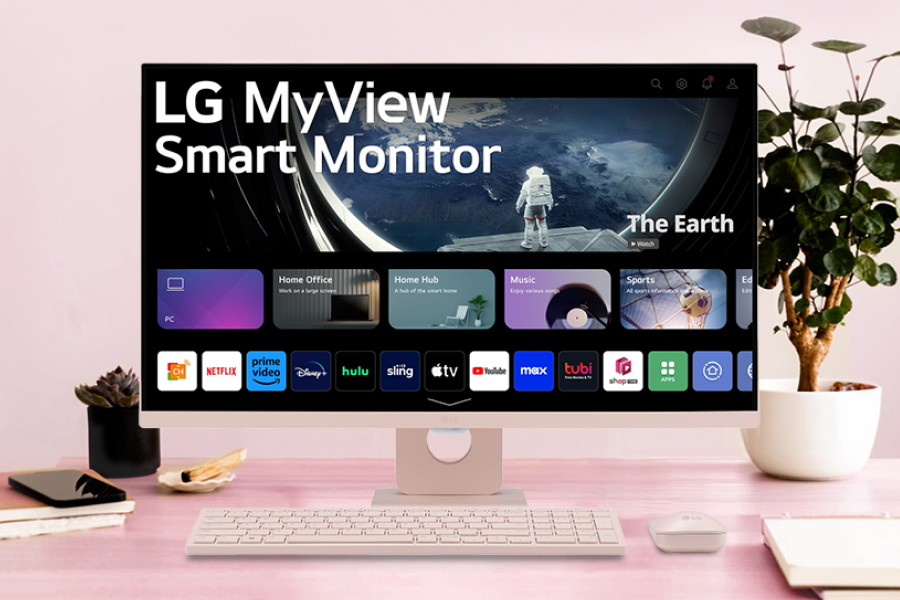 The pink LG MyView smart monitor on a desk.