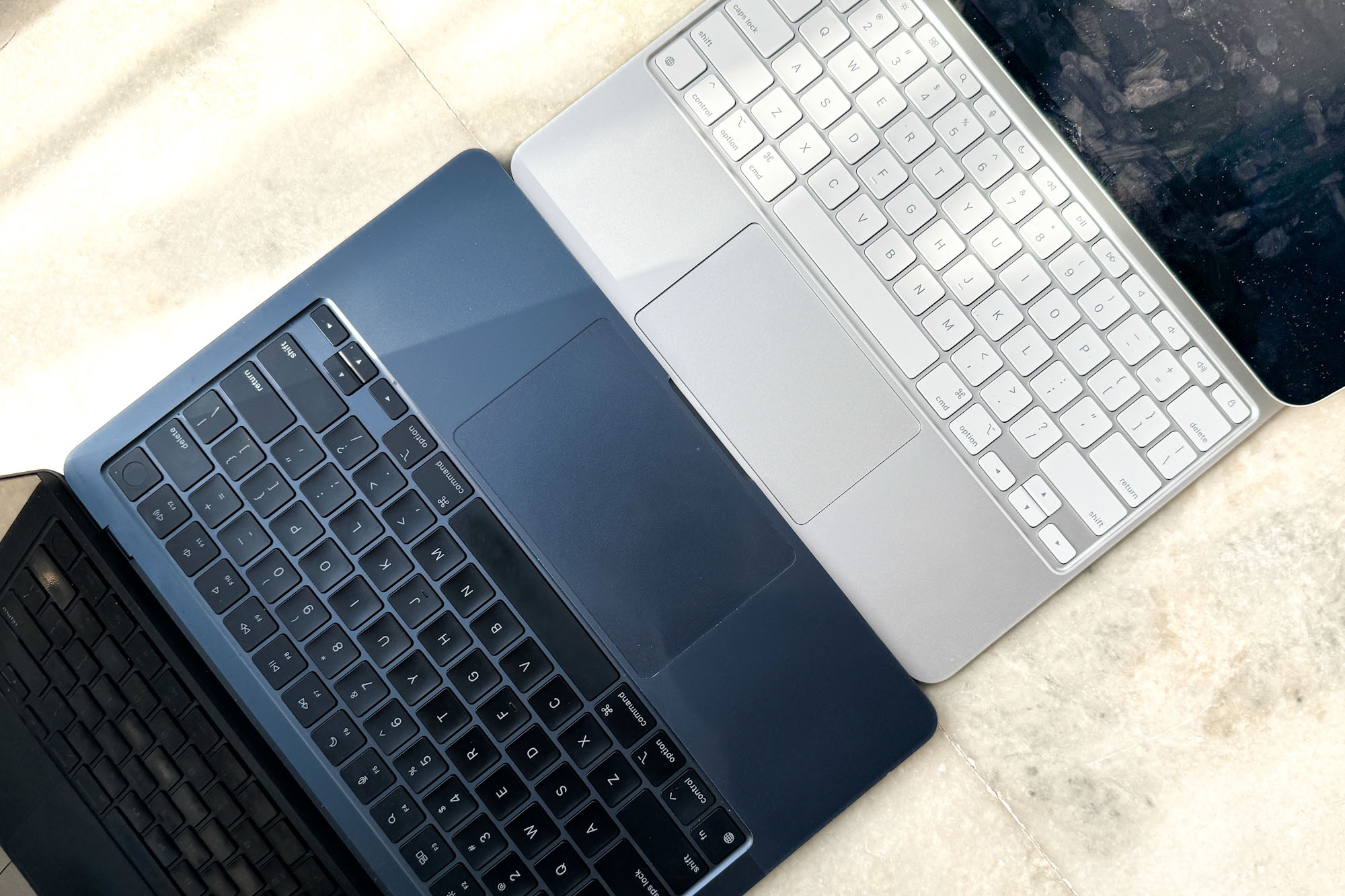 Side view of Magic Keyboard And MacBook Air.