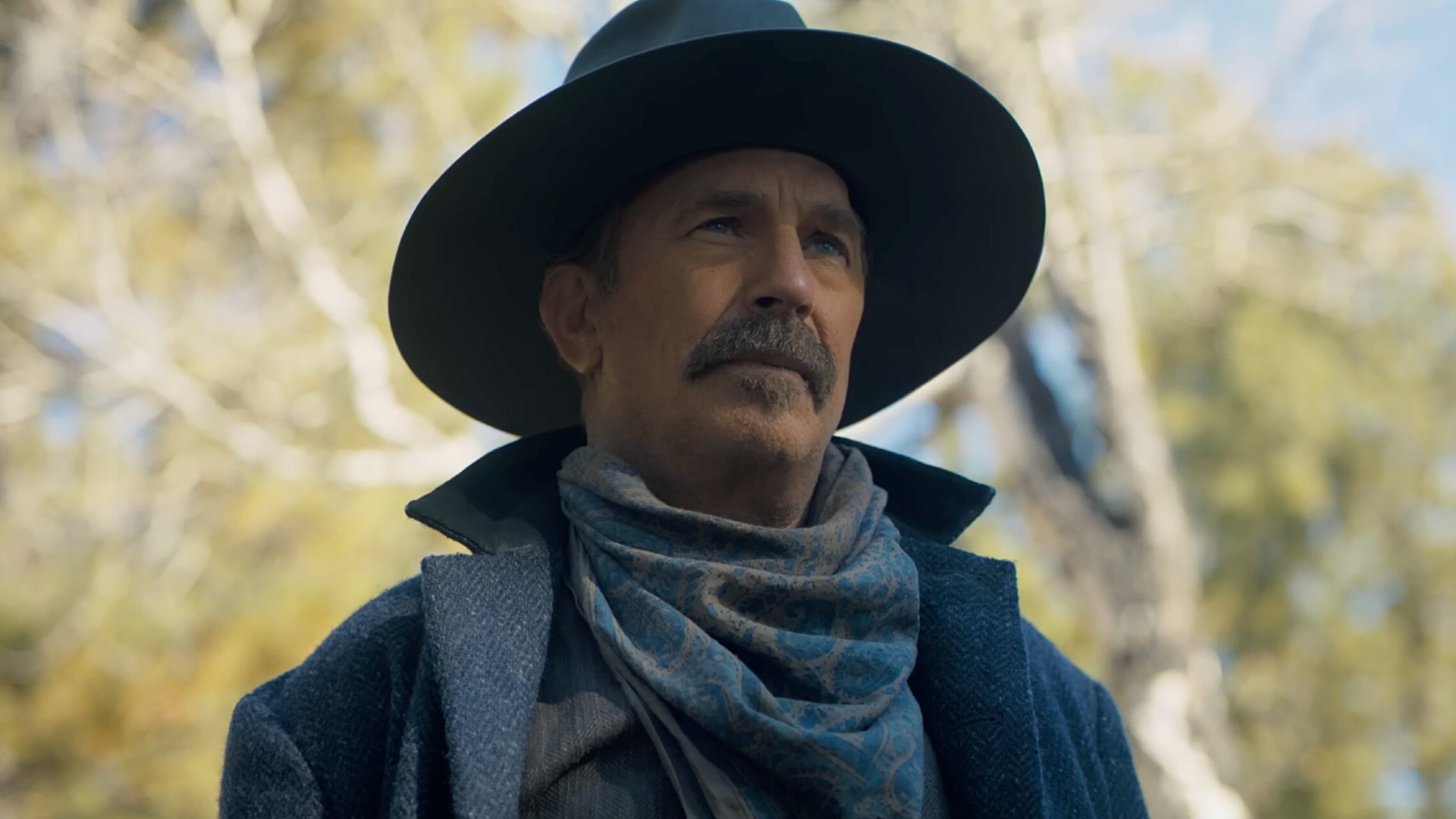 Kevin Costner stares with cowboy flintiness in a still from Horizon: An American Saga—Chapter 1