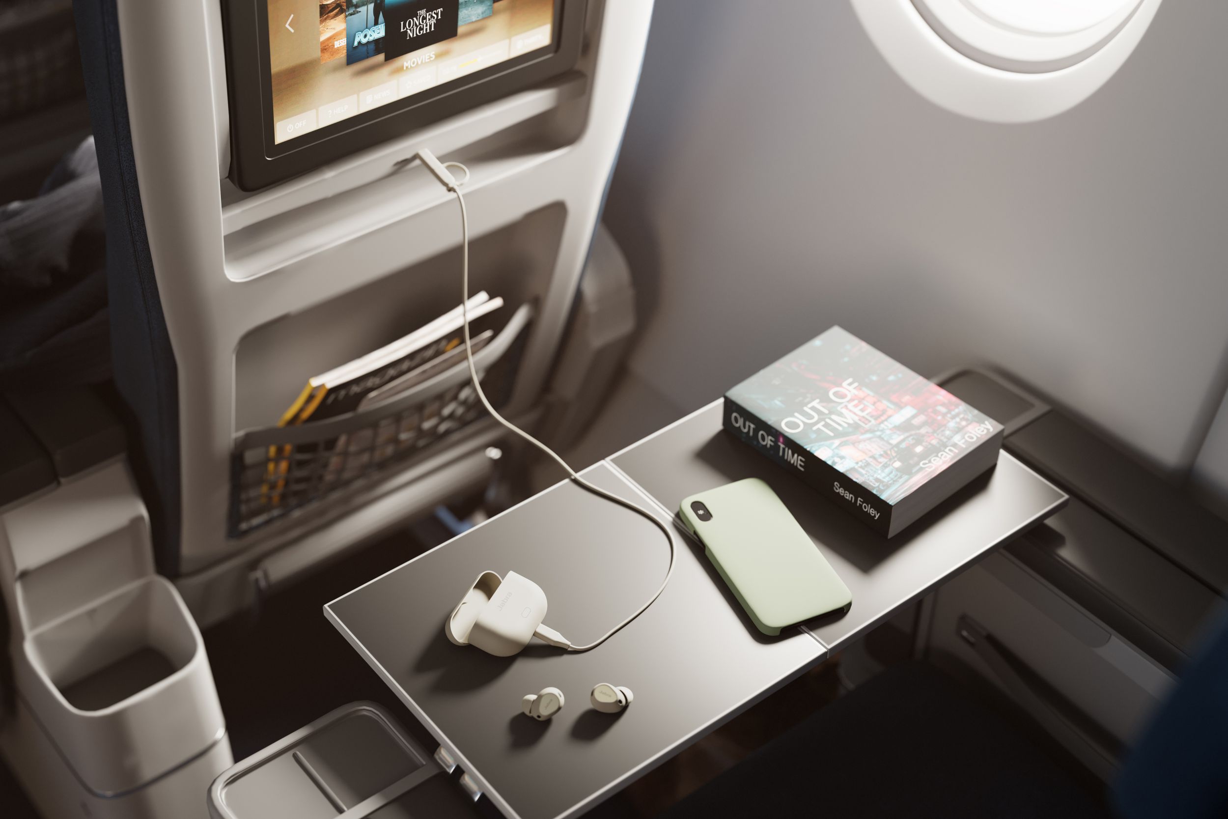 Jabra Elite 10 Gen 2 connected to an airplane seatback entertainment system.