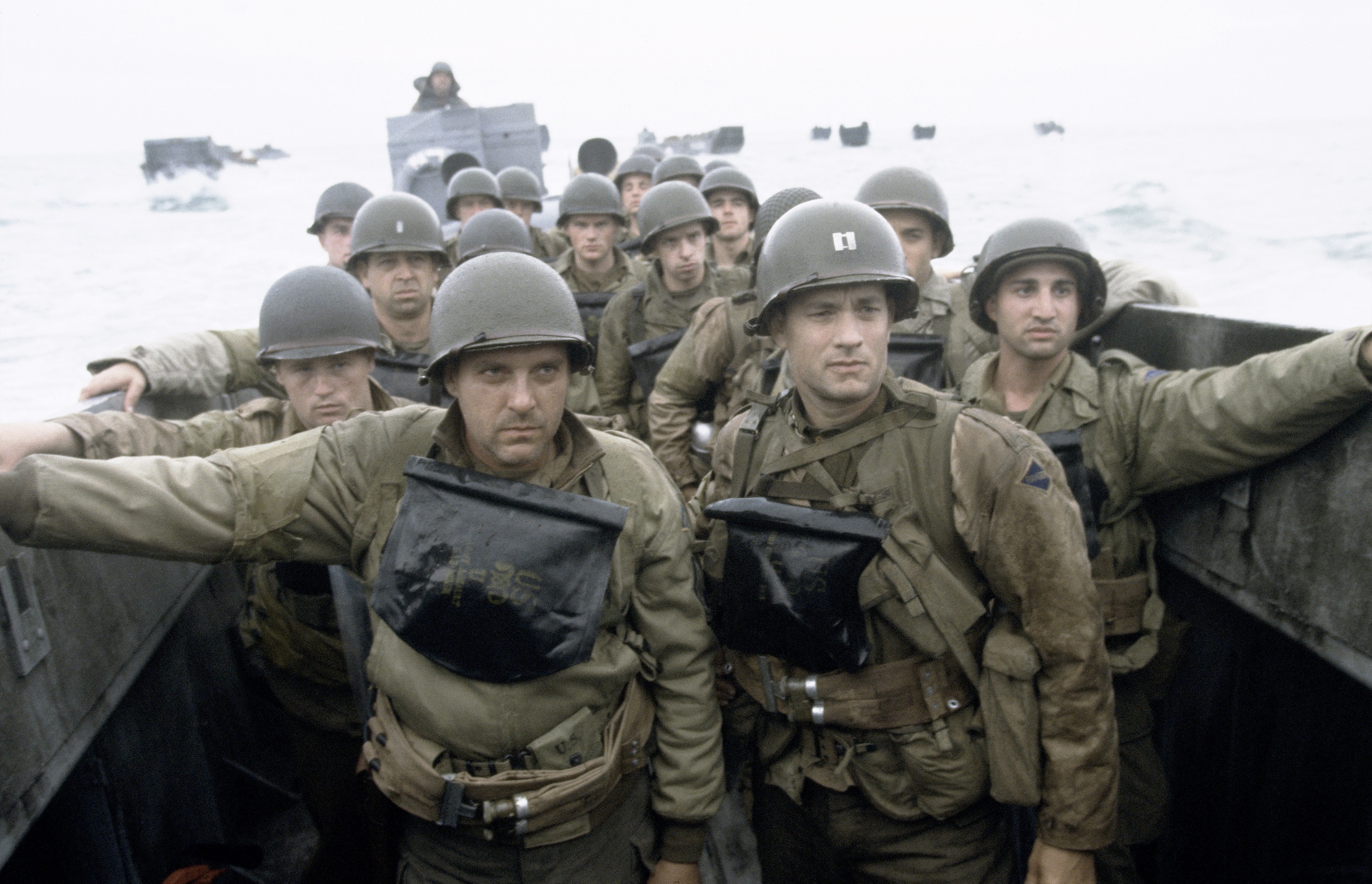 Tom Hanks (center right) and the ensemble of Saving Private Ryan.