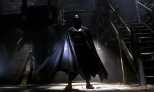 Michael Keaton poses in his batsuit in Batman.