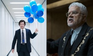 A man holds balloons on the left while another man stands and talks on the right.