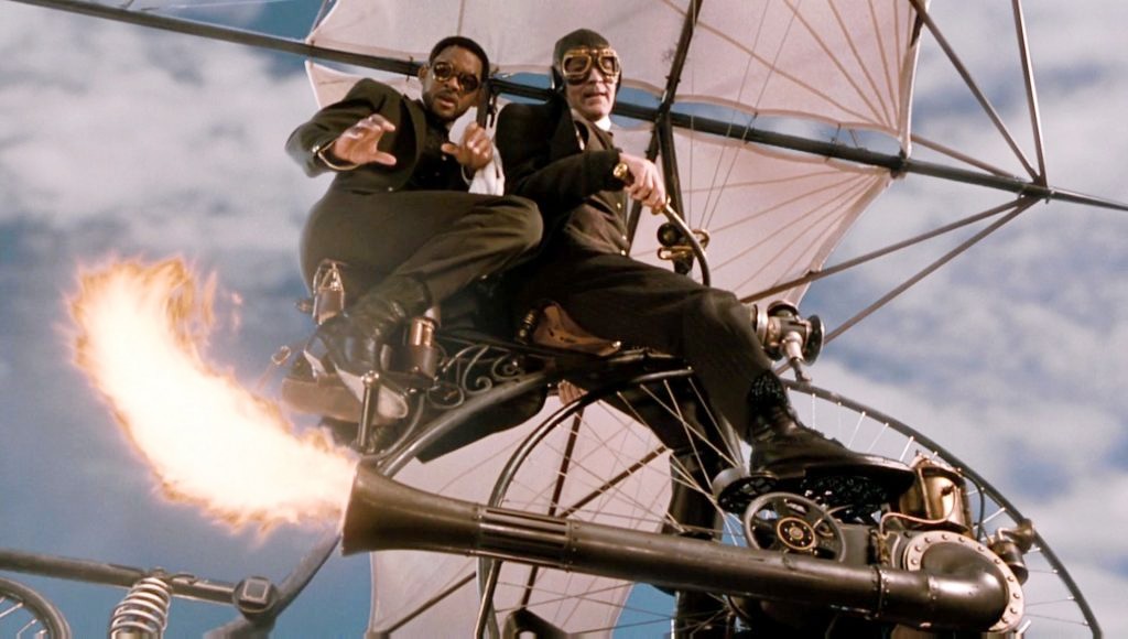 Two men fly on a contraption in Wild Wild West.