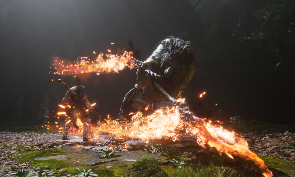 A monkey man faces off against a fiery boss in Black Myth: Wukong.