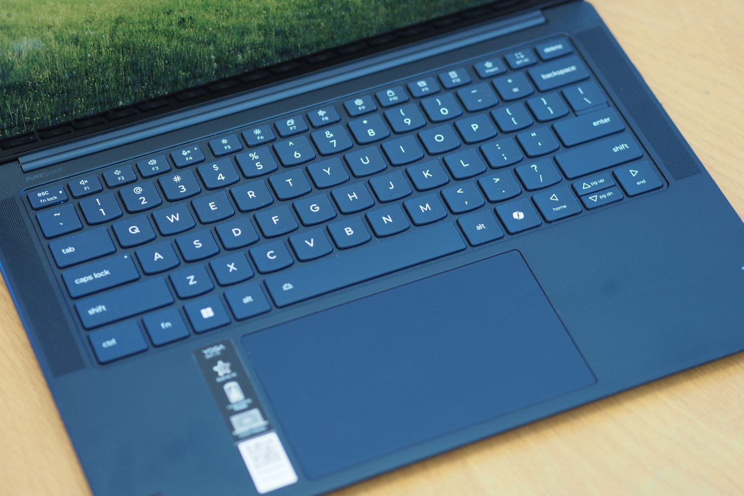 Lenovo Yoga Slim 7x top down view showing keyboard and touchpad.