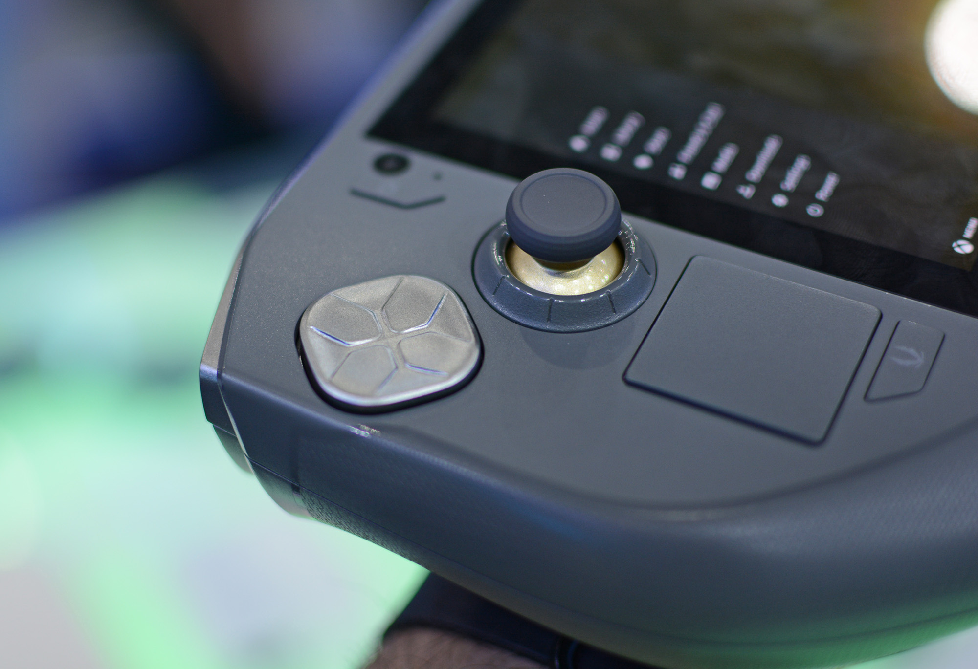 The Hall-effect joystick and D-pad on the Zotac Zone handheld gaming console.