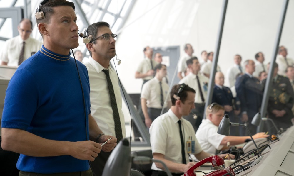 Channing Tatum and Ray Romano stand in Mission Control in Fly Me to the Moon.