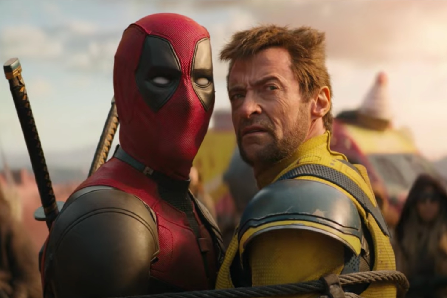 Deadpool and Wolverine stare back in the same direction in "Deadpool & Wolverine."