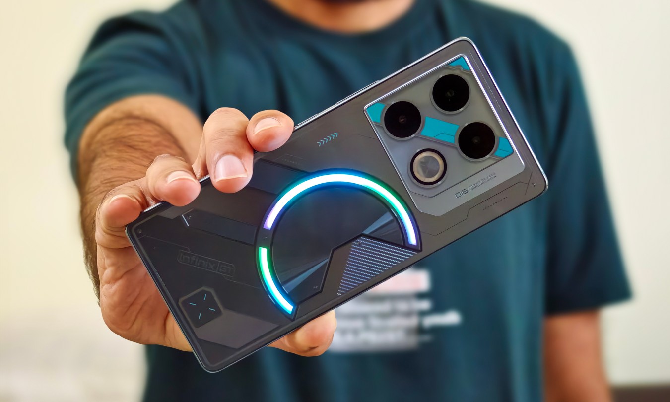 Infinix GT 20 Pro gaming phone held in hand.