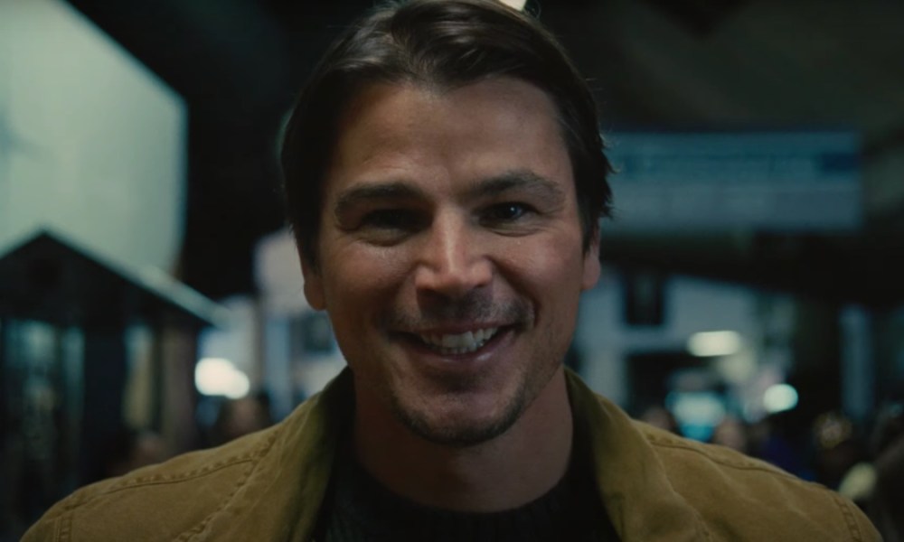 Josh Hartnett awkwardly smiles and stares.