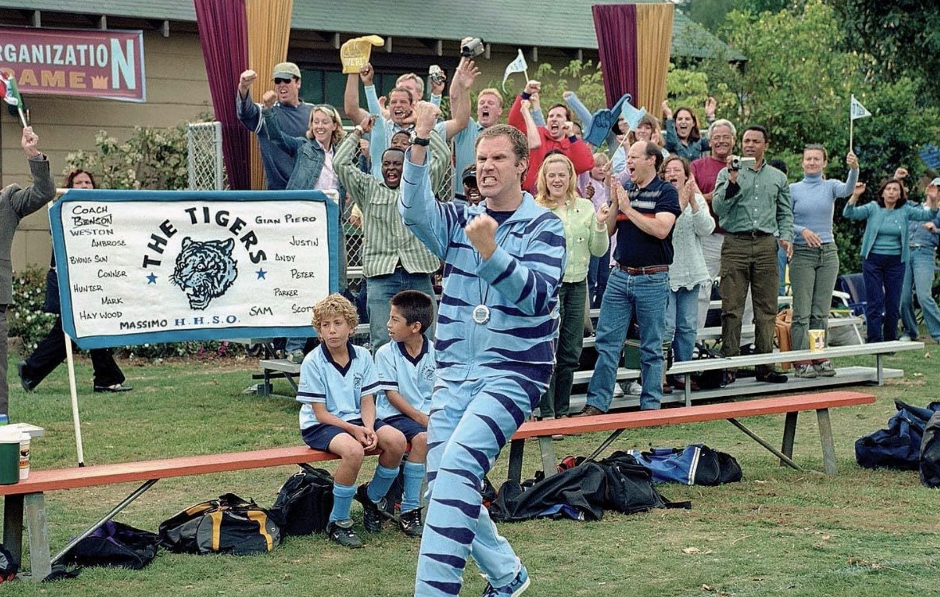 Will Ferrell pumps his fist on a soccer sideline.