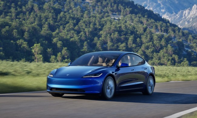 Blue Tesla Model 3 Highland on the road