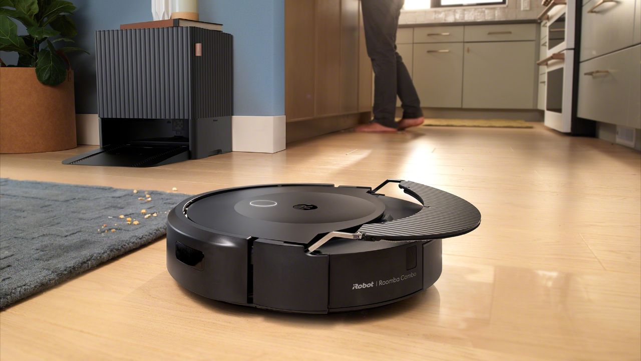 The Roomba Combo 10 Max lifting its mop.