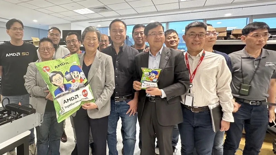 AMD executives holding Kuai Kuai. 