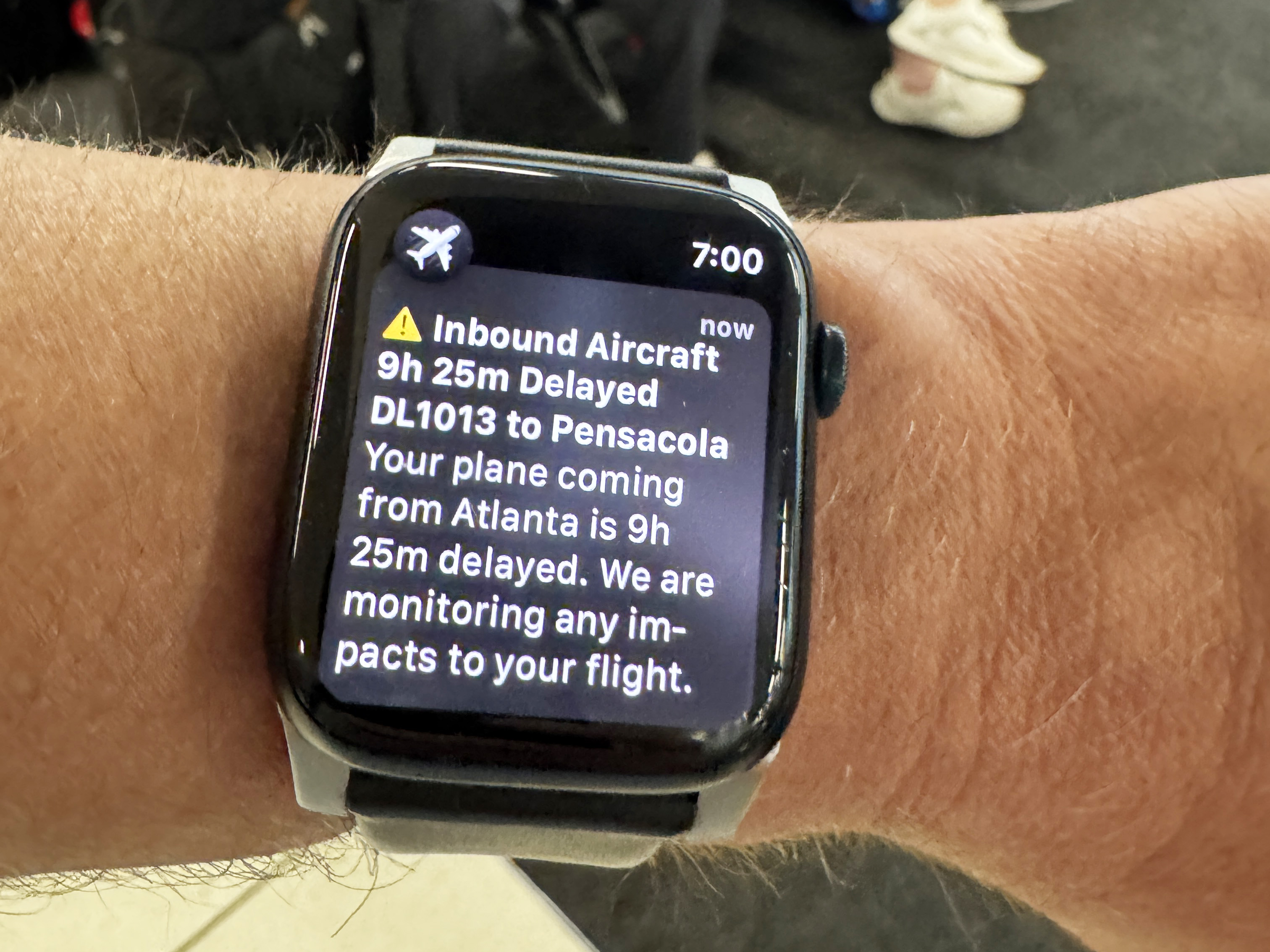 A notification from the Flighty app on an Apple Watch.