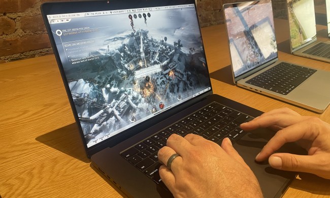 Frostpunk 2 runs on a MacBook.