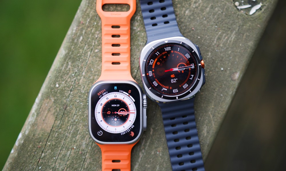 The Samsung Galaxy Watch Ultra and Apple Watch Ultra 2 sitting next to each other.