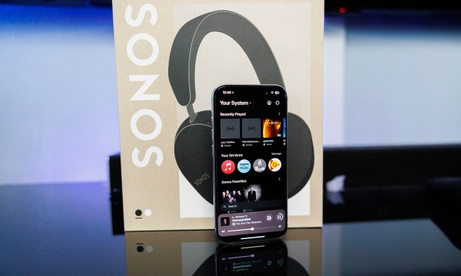 The Sonos app in front of the Sonos Ace headphones box.