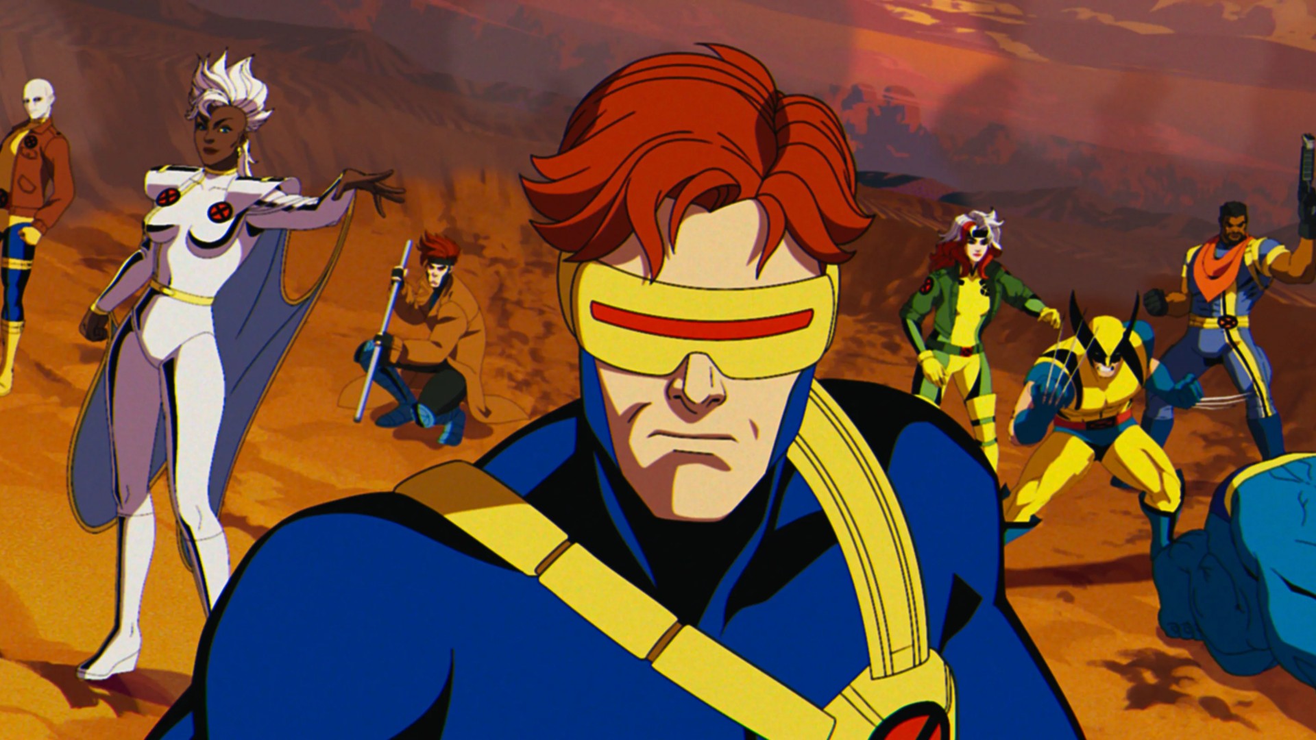 Cyclope pose en gros plan avec les autres X-Men derrière lui dans une photo de la série X-Men '97.