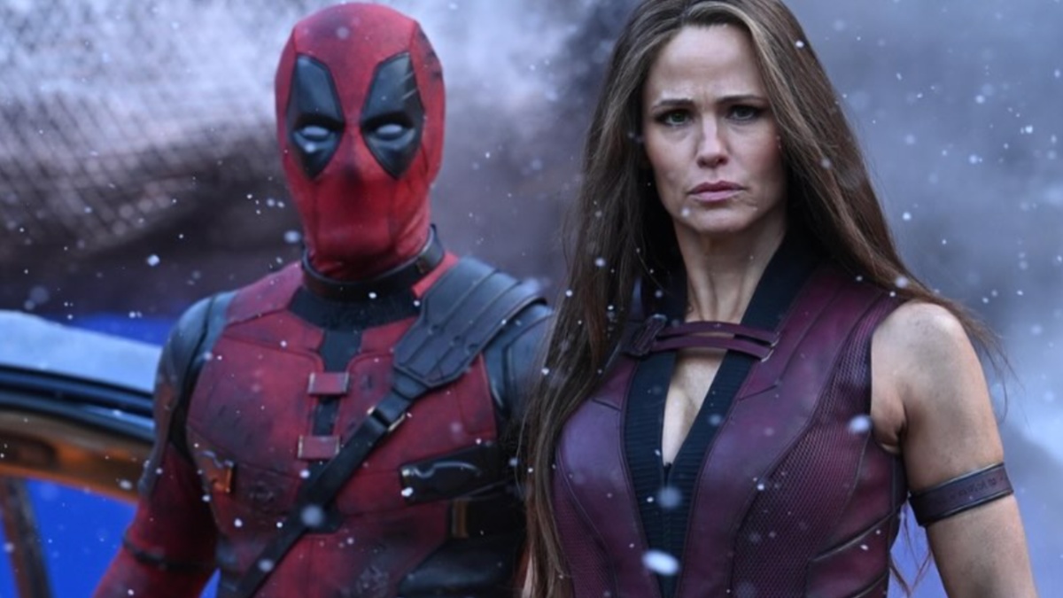 Deadpool and Elektra stand next to each other and stare.