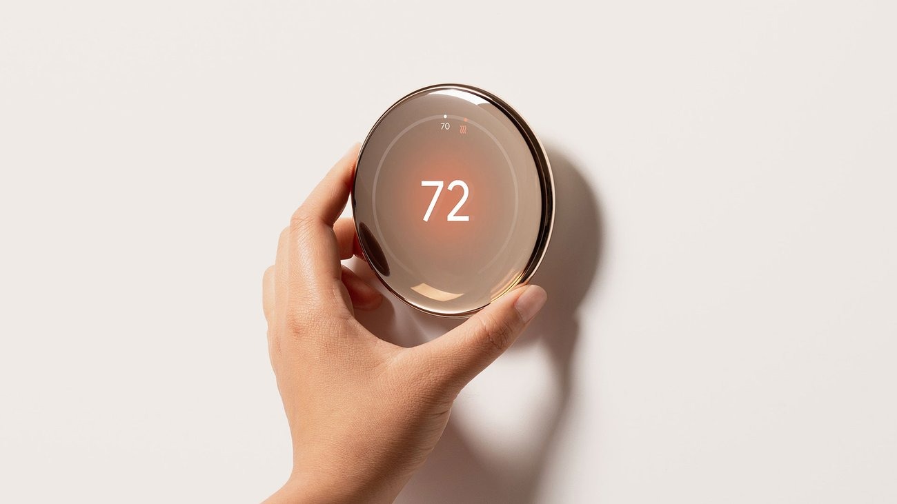 The Nest Learning Thermostat 4th Gen on a wall.