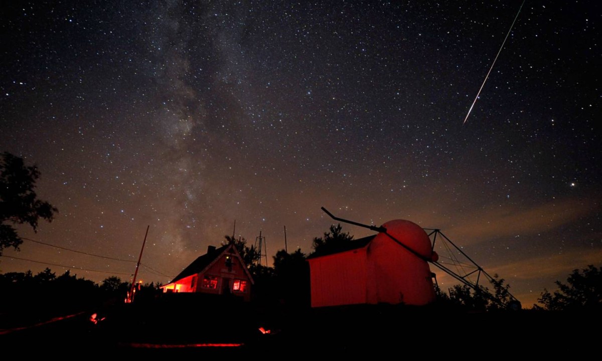 A bright Perseid meteor streaked down on August 7, 2010, over buildings at the Stellafane amateur astronomy convention in Springfield, Vermont.