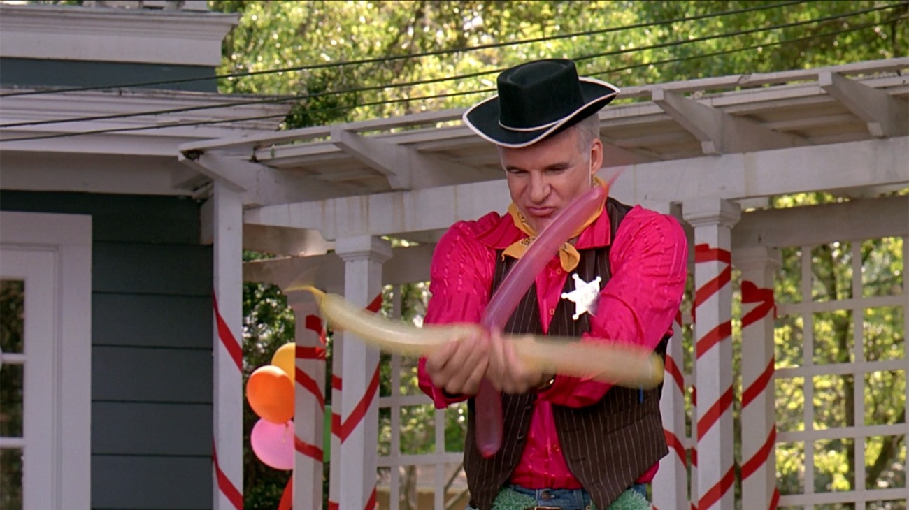 Steve Martin stellt in Parenthood Tierballons her.