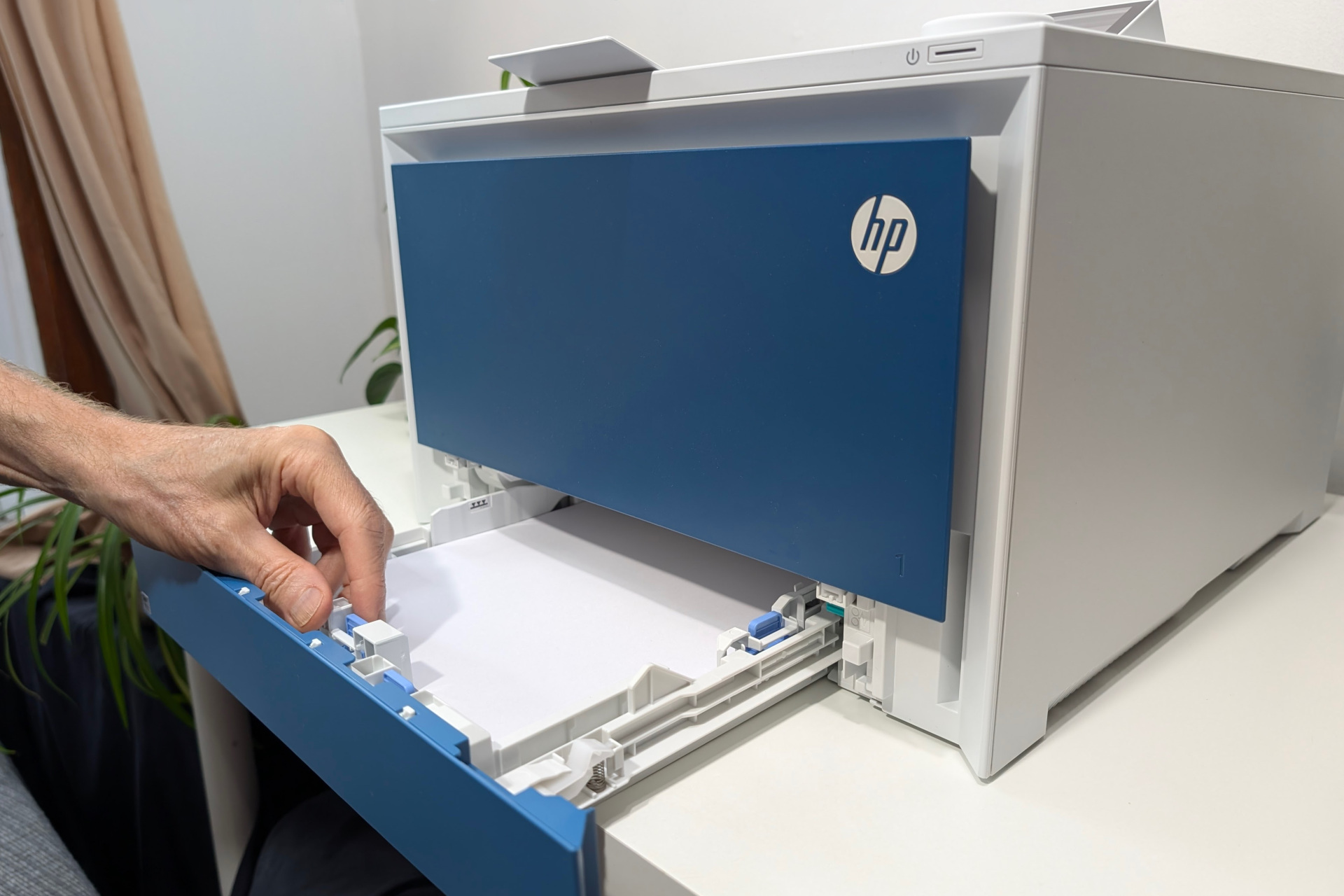 The Color LaserJet Pro 4201dw's main paper tray holds 250-sheets, and the media tray holds 50 sheets.