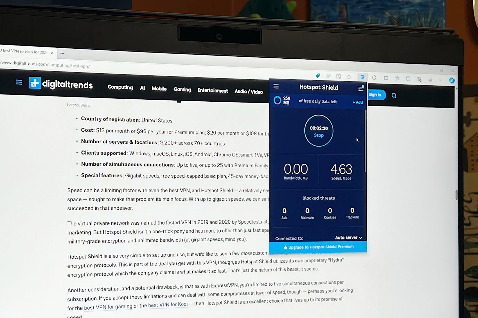 The browser extension for Hotspot Shield's free version appears on a PC monitor.