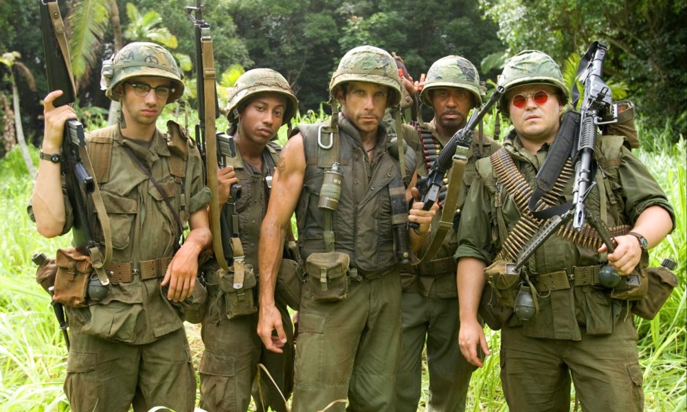 A group of soldiers pose for a picture in Tropic Thunder.