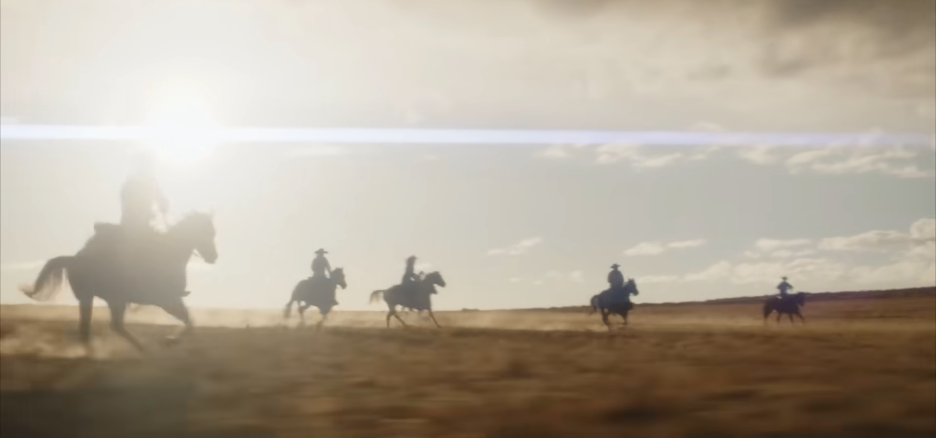 Des hommes traversant un champ à cheval avec le soleil brillant dans le ciel dans « Wyatt Earp and the Cowboy War ».