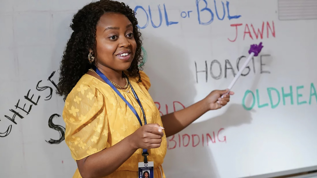 Quinta Brunson as a teacher pointing to the whiteboard on Abbott Elementary.