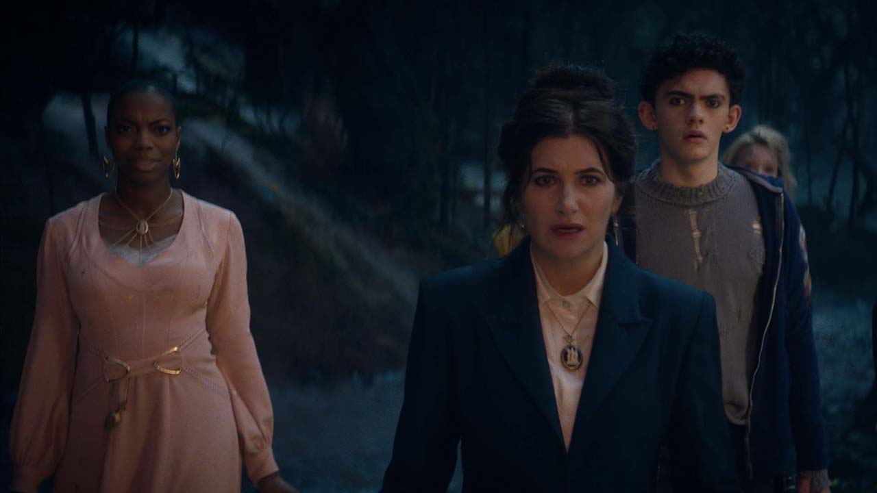 Agatha looking stunned, a young man and woman behind her, in a scene from Agatha All Along.