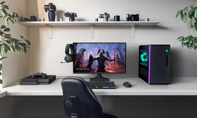 An Alienware monitor sitting on a desk.