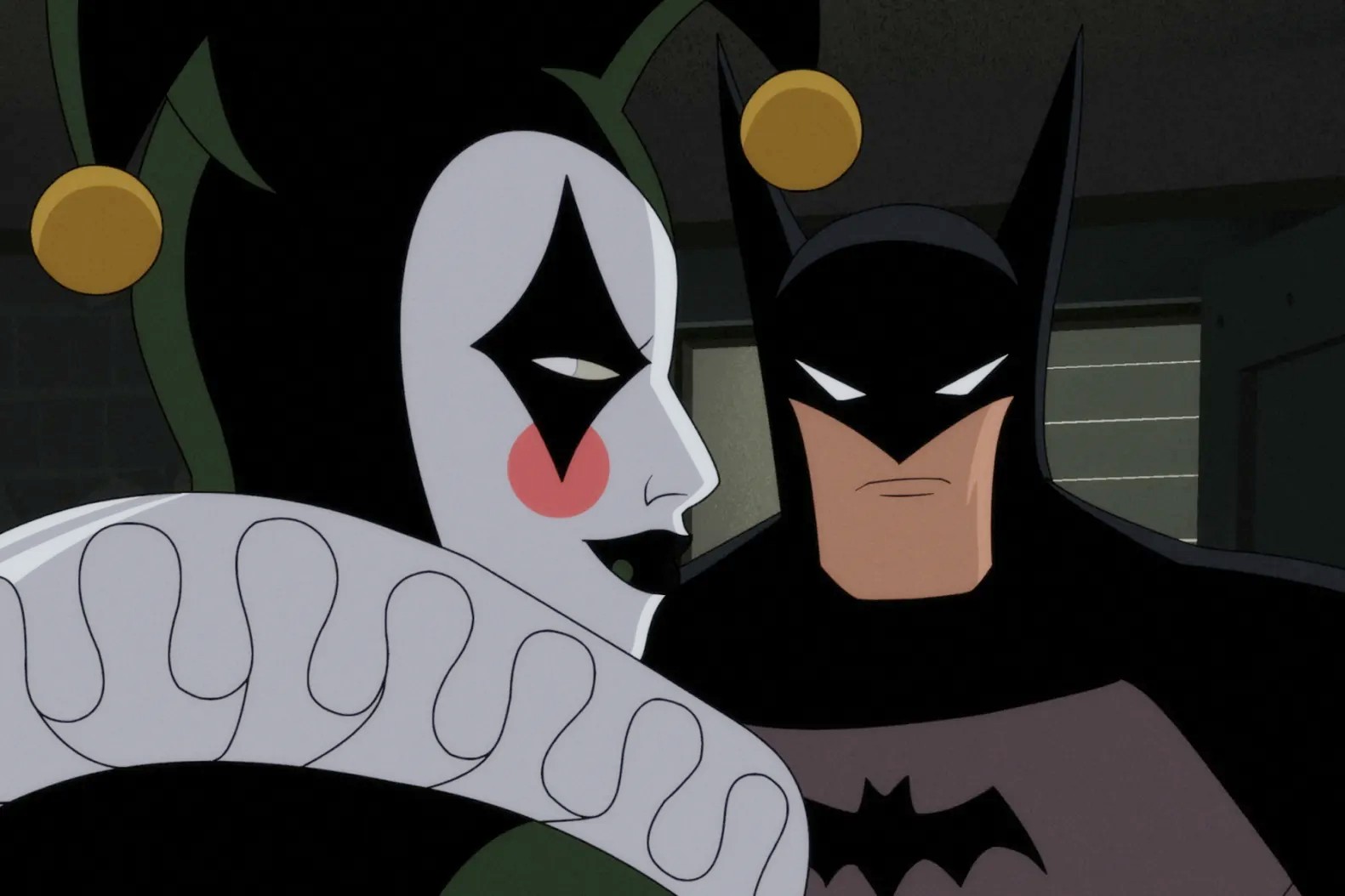 Batman affronte Harley Quinn dans Batman : Caped Crusader.