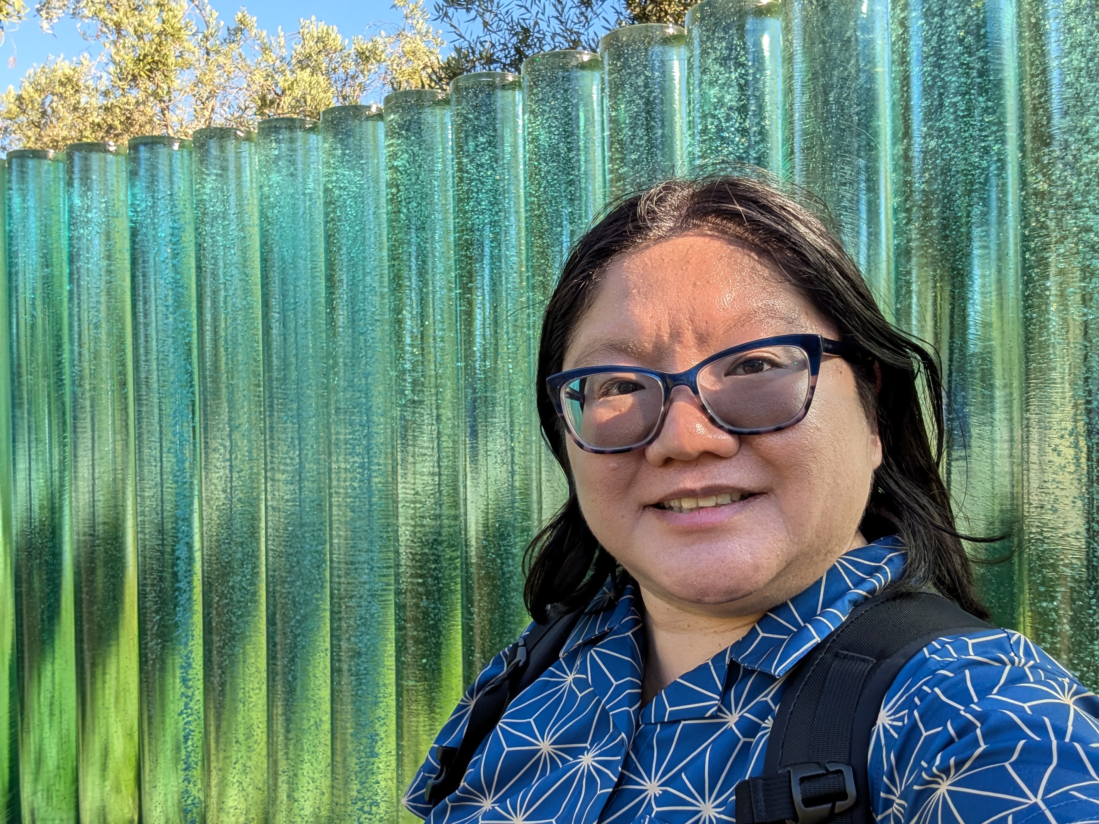 Selfie at glass sculpture at Apple Park Visitor Center.