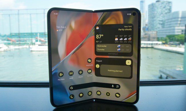 The Google Pixel 9 Pro Fold with its inner display on, showing the home screen.