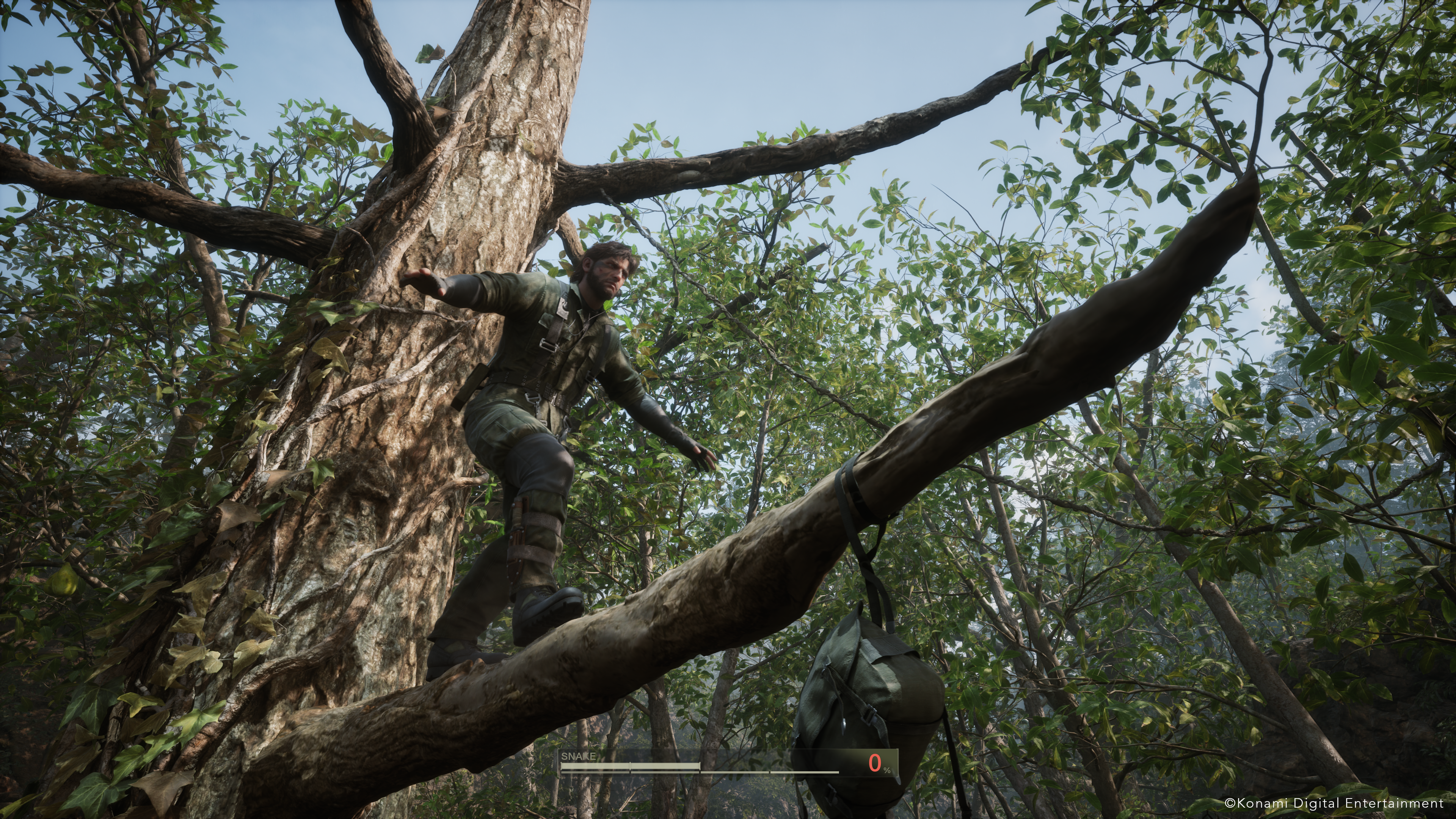 Snake walks over a tree branch in Metal Gear Solid Delta.