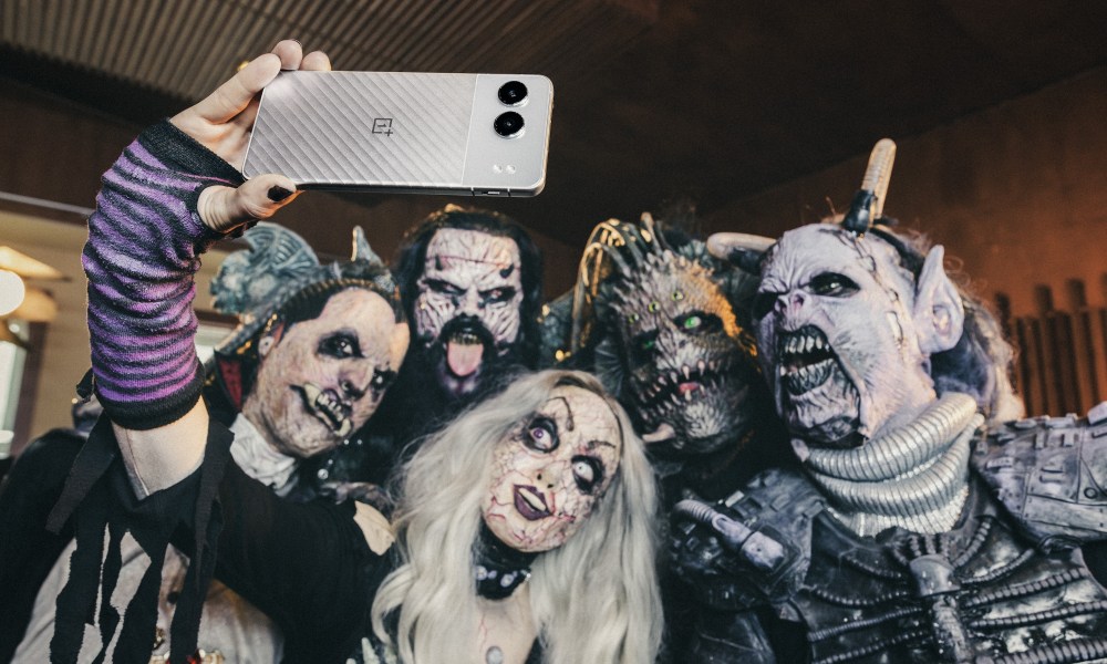 A promo photo showing heavy metal band Lordi taking a selfie with the OnePlus Nord 4.