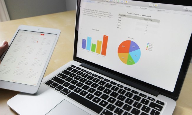 a laptop with a spreadsheet graph displayed