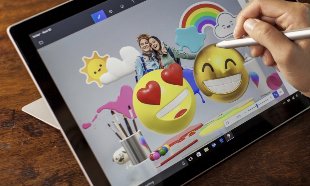 Someone using Paint 3D on a tablet with a stylus.