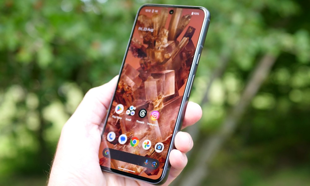 A person holding the Google Pixel 8.