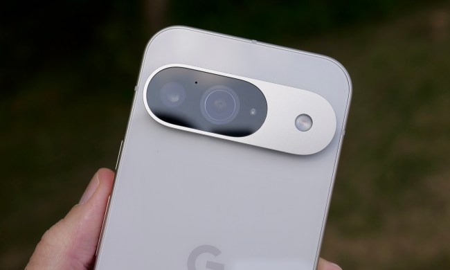 A person holding the Google Pixel 9, showing the camera.