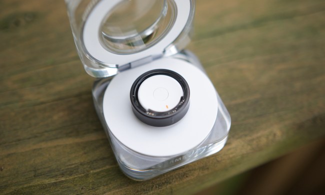 The Samsung Galaxy Ring in its charging case.